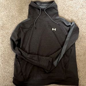 Under Armour with turtle neck top.